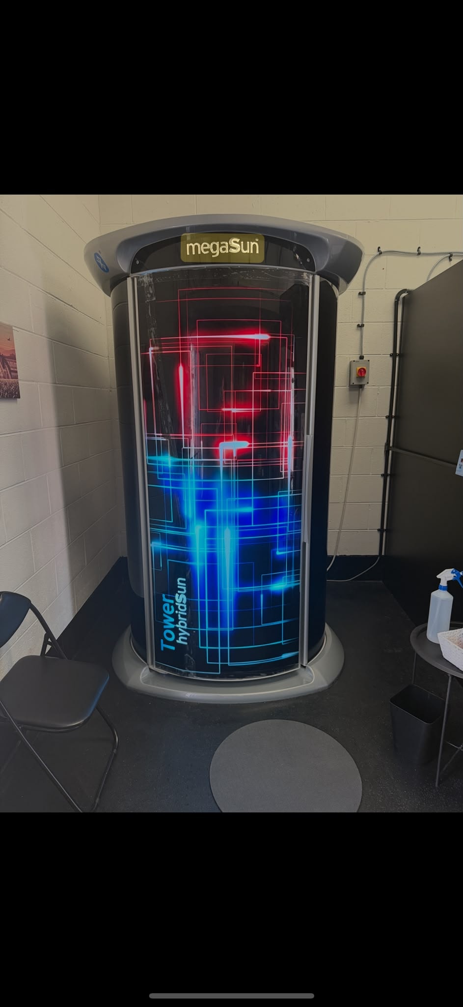 MegaSun Stand-Up Tower tanning bed at Serenity Sunbeds